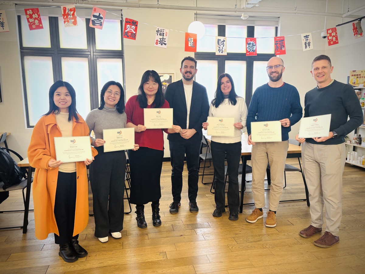 Workshop graduates with their completion certificates