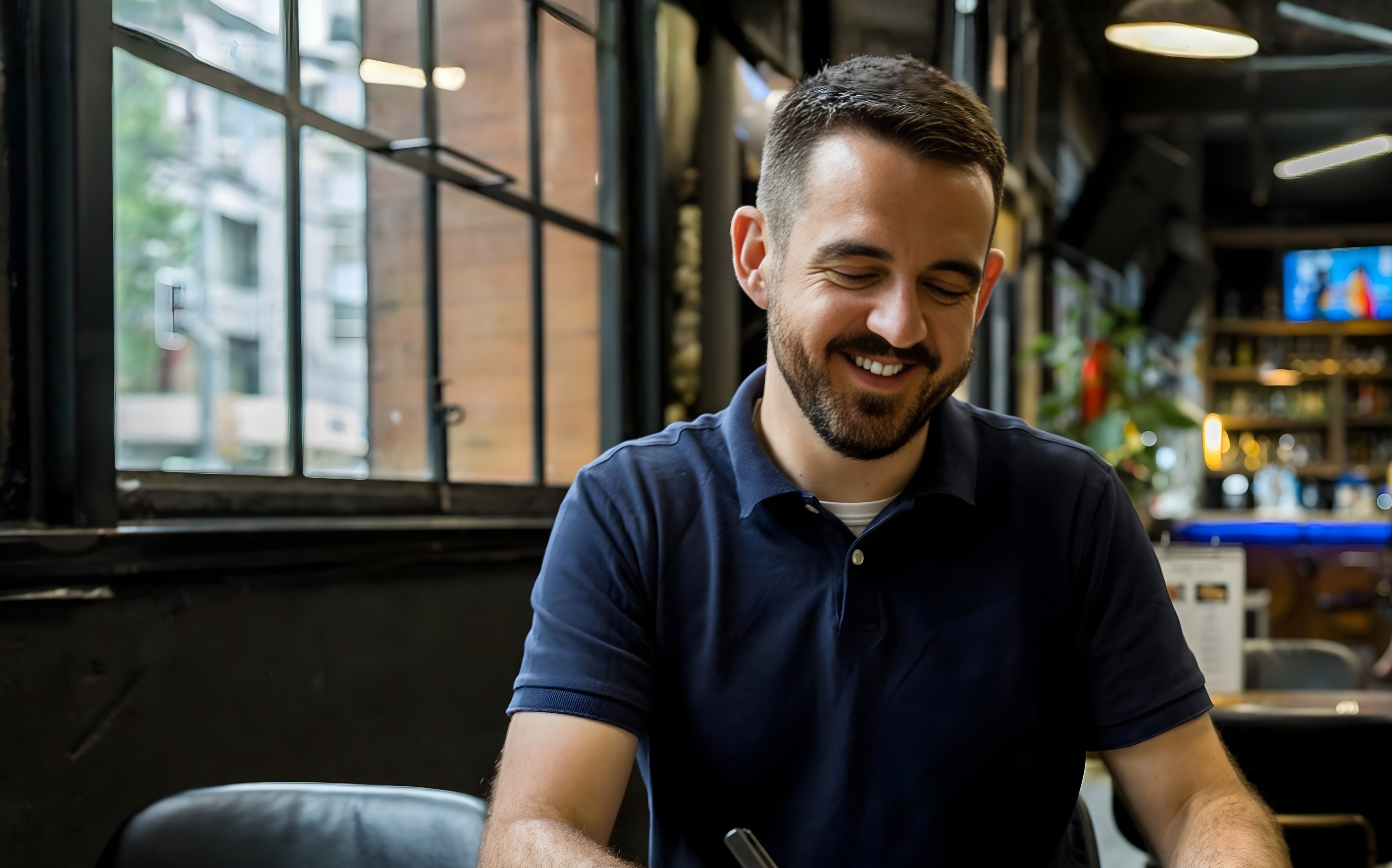 Shane Leaning, organisational coach and host of the Education Leaders podcast, writing at his desk
